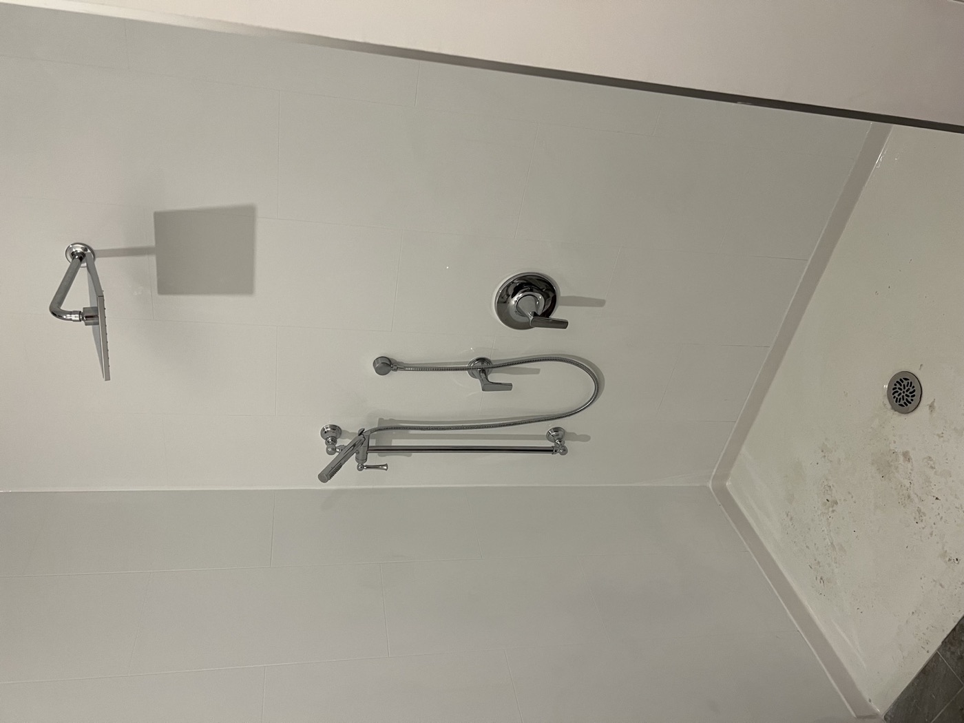 Finished shower plumbing fixture installation